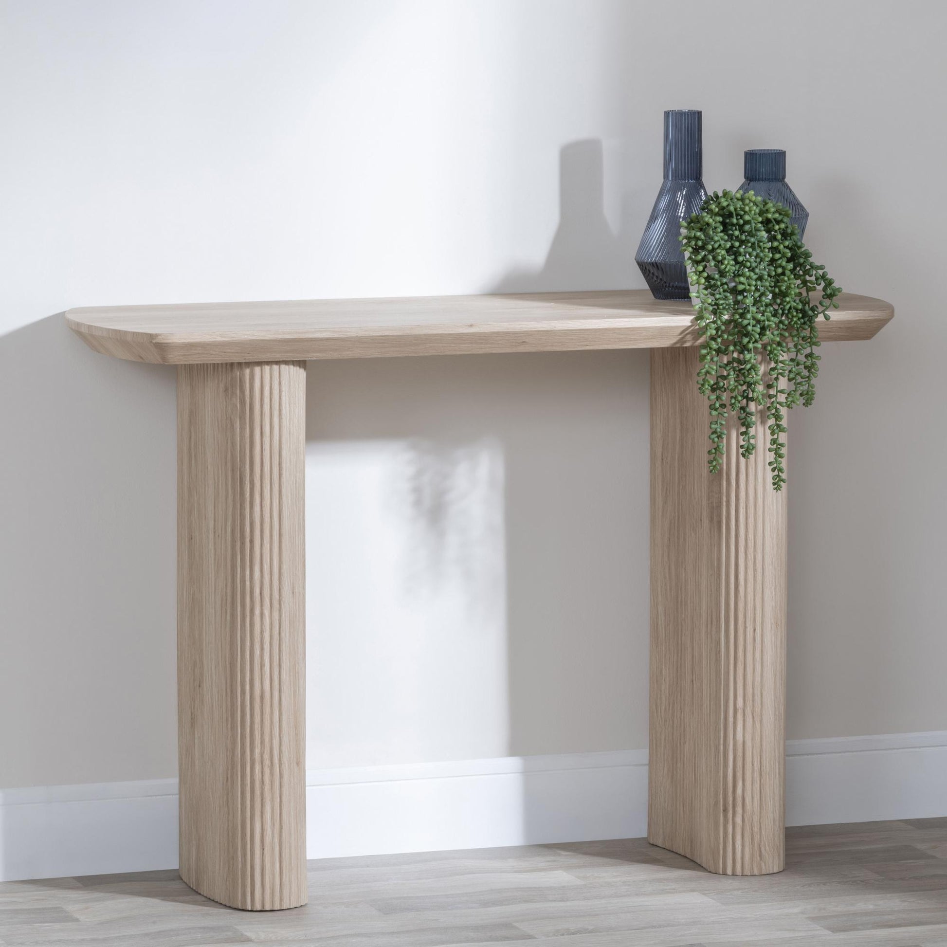 Renzo Oak Oval Console Table with Fluted Ribbed Drum Base