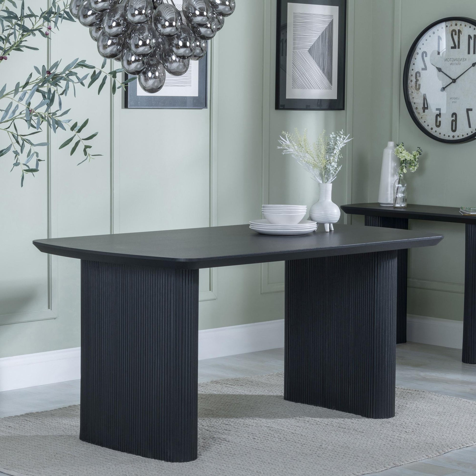Renzo 160cm Black Oval Dining Table with Fluted Ribbed Double Pedestal Base
