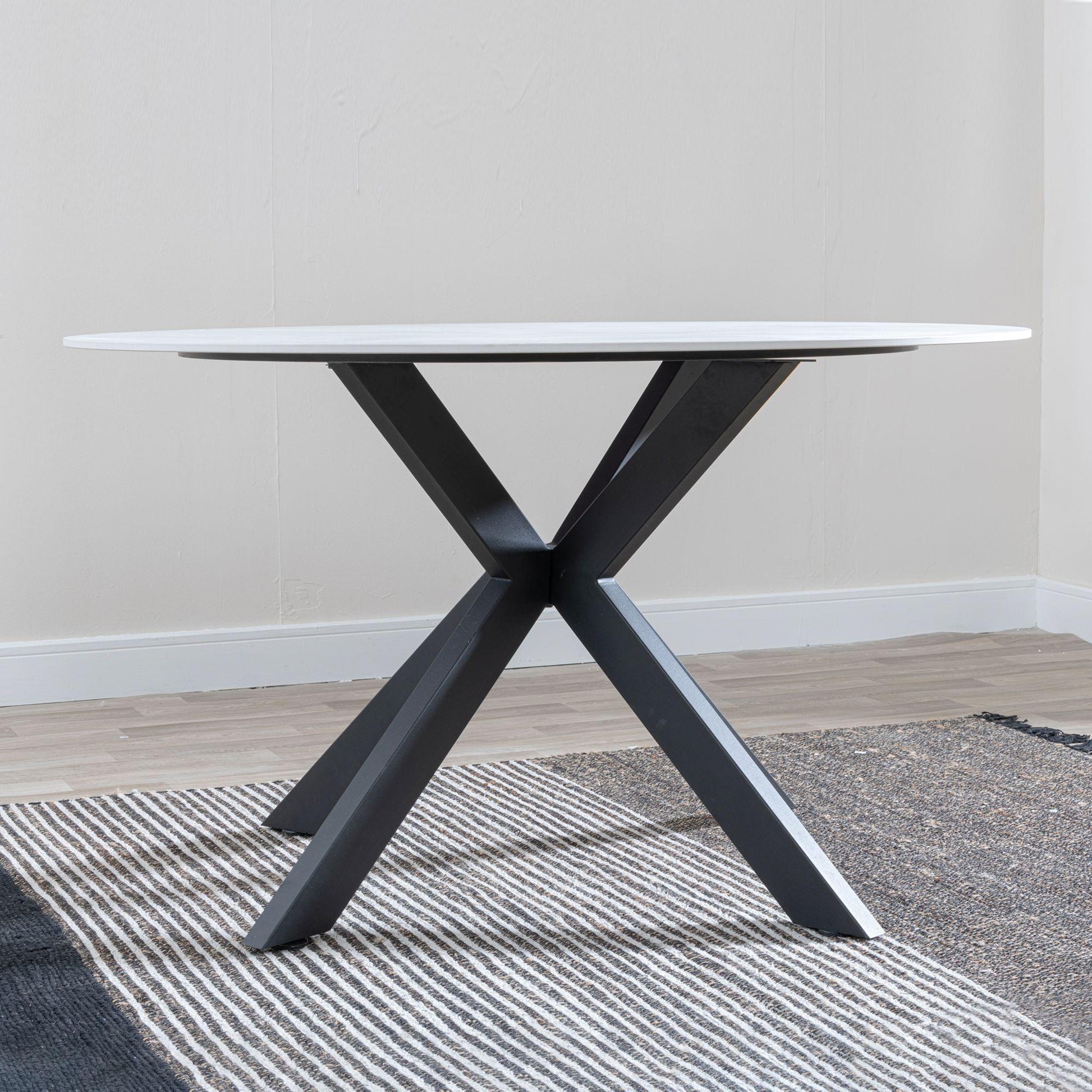 Avesta White Sintered Stone Round Dining Table with Black Star Base - 130cm