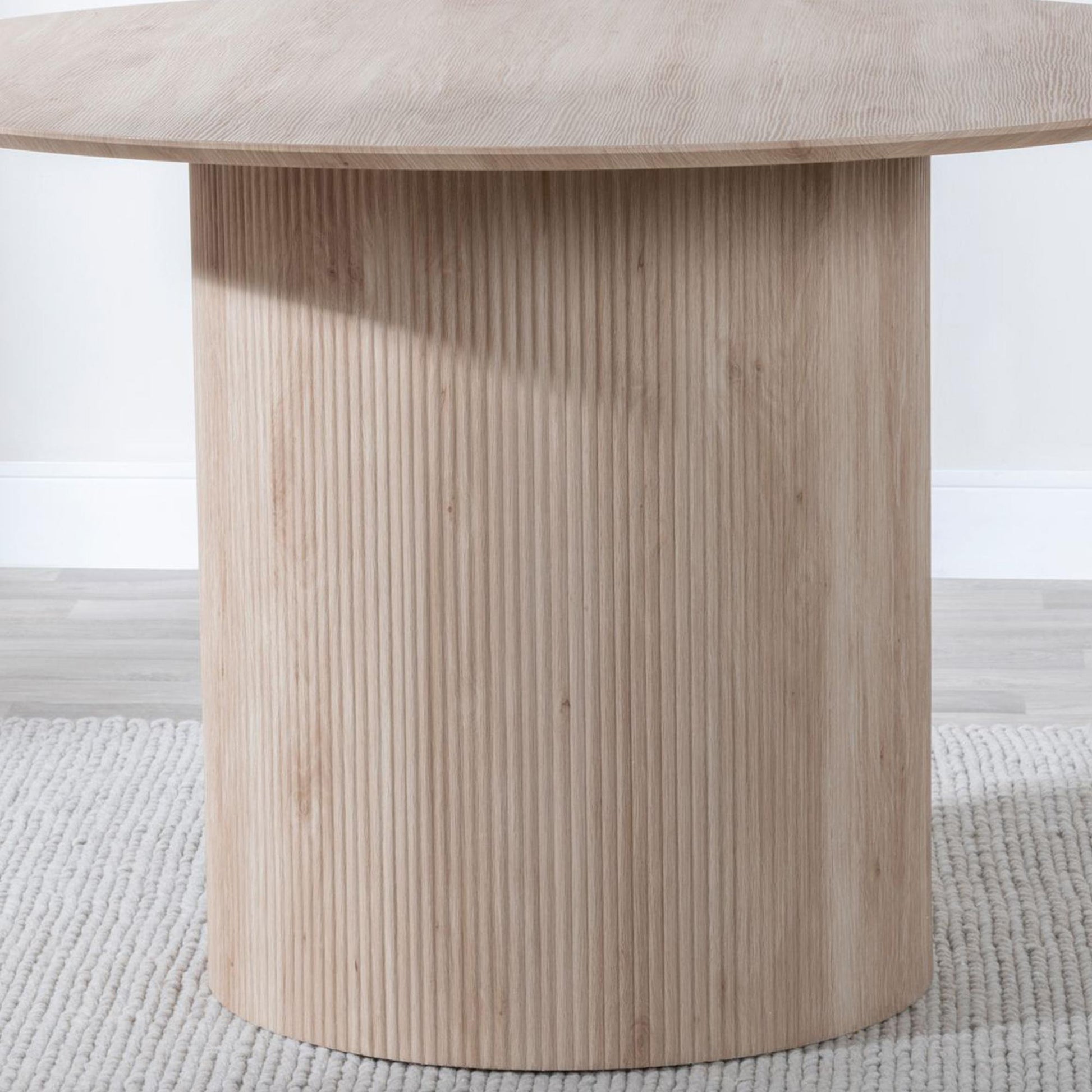 Renzo 120cm Oak Round Dining Table with Fluted Ribbed Drum Base