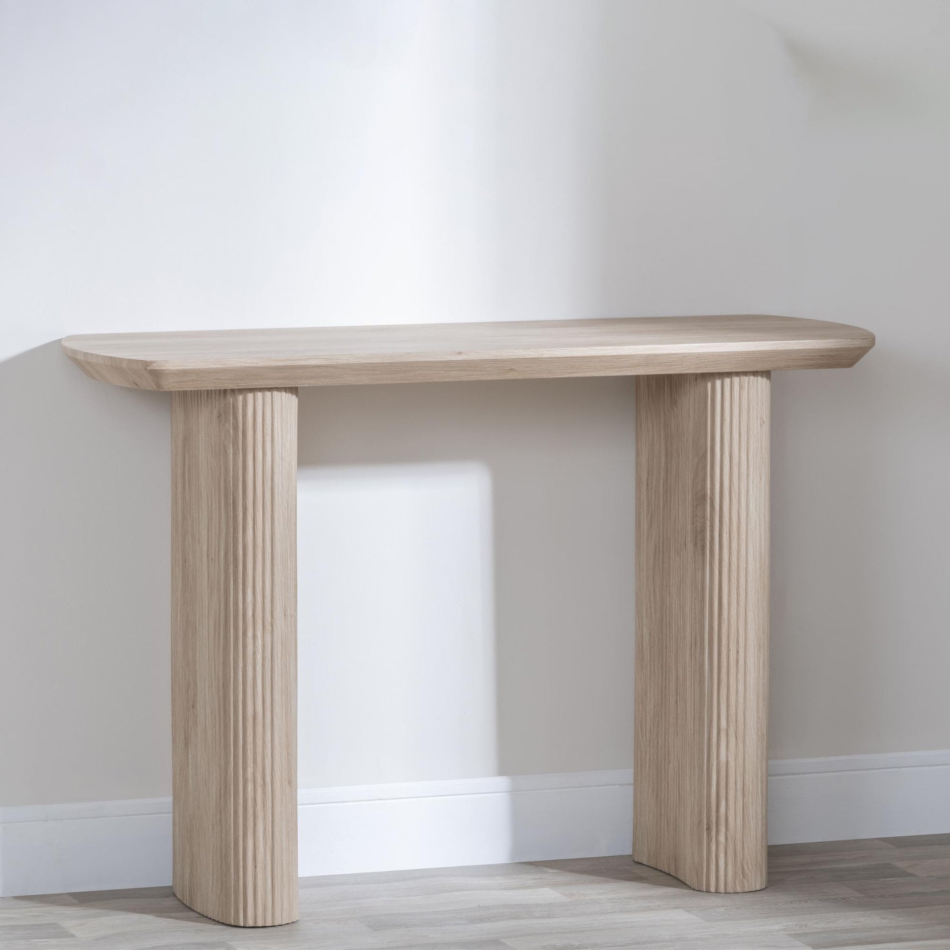 Renzo Oak Oval Console Table with Fluted Ribbed Drum Base