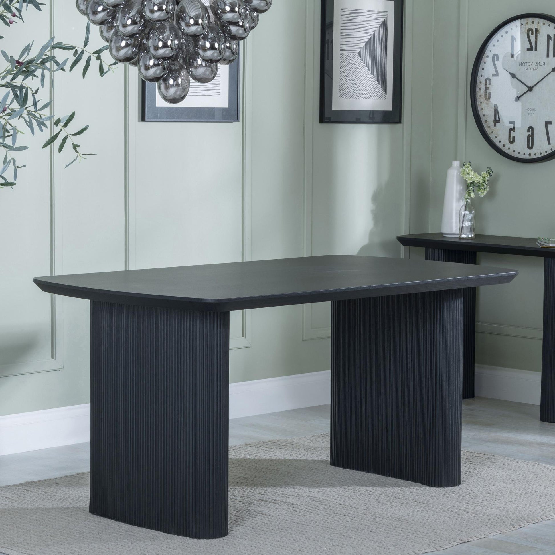 Renzo 160cm Black Oval Dining Table with Fluted Ribbed Double Pedestal Base